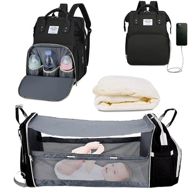 🎒 תיק חיתולים 3 ב-1 – תיק גב + מיטה ניידת + תחנת טעינה